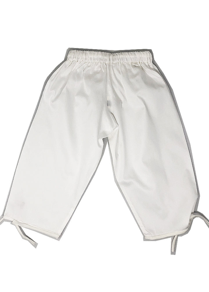 100% cotton baggy pants, with an elastic waist and a crown embroidery. Ankle lenght, unisex. Super ultra fresh, great for the beach or outdoors, but also to go to school, to play at home or for yoga classes. 