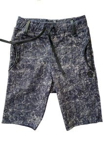 Stretch denim shorts, lightweight, elastic & adjustable waistband, denim style but very comfy, no snaps or closures. Cool for a very casual look paired with a t-shirt and a pair of snickers, but also great for an evening appearance with a black jacket.  Dyed in a batik style but in a much rocker version. Unisex. 