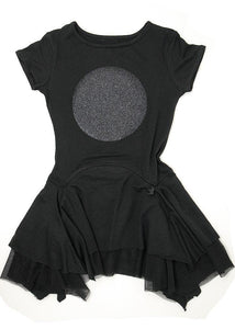 Black super soft dress with a large lunar eclipse in glitter on the chest, beautifully layered skirt. Short sleeves, round neck, it's a must. Inspired by post punk shapes, achieving our goal of designing tutu style dresses that are almost lounge pieces, so soft and comfy. 