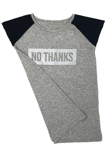 It's a long t-shirt that they will use as a dress too, so soft and cool, we made the shoulders in black because it frames so nicely the stamp.  A large NO THANKS! in reflective gray vinyl takes us back to the era of the punk rebellion. It's a MUST to use non-stop. To lounge, to sleep, to go to the beach, and also great with a pair of black leggings.
